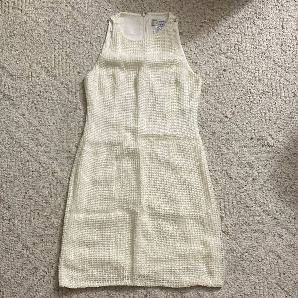 Elegant Cream Sleeveless Dress with Sequin Detailing